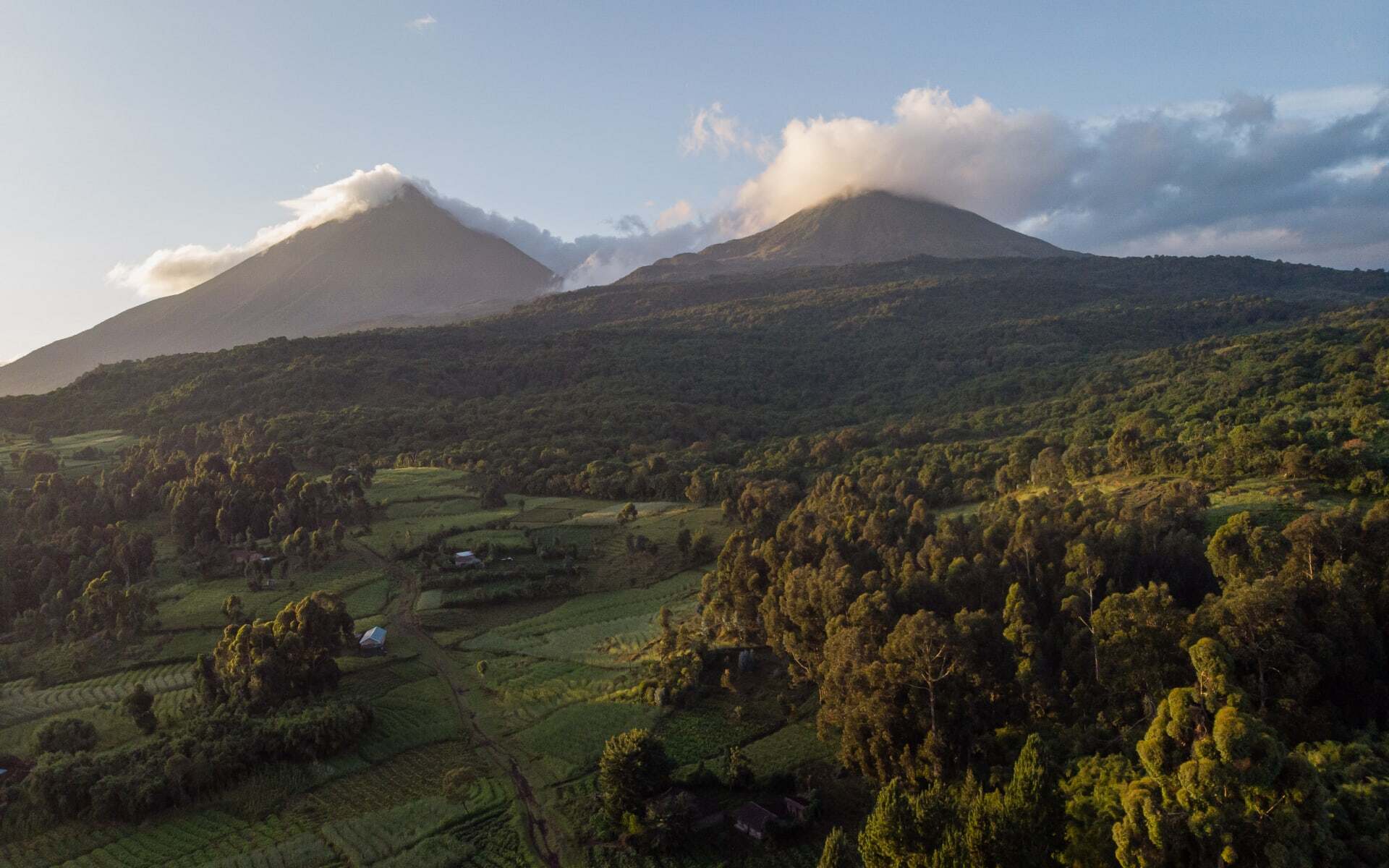 Mount Gahinga Lodge has a mountainous backdrop.