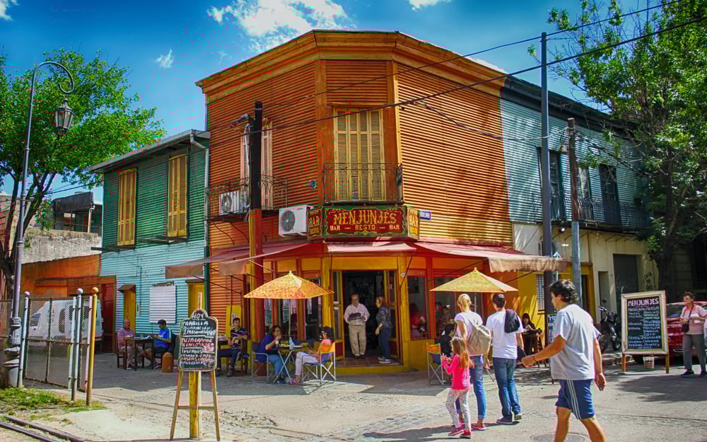 People wander the bright streets of Buenos Aires, Argentina.