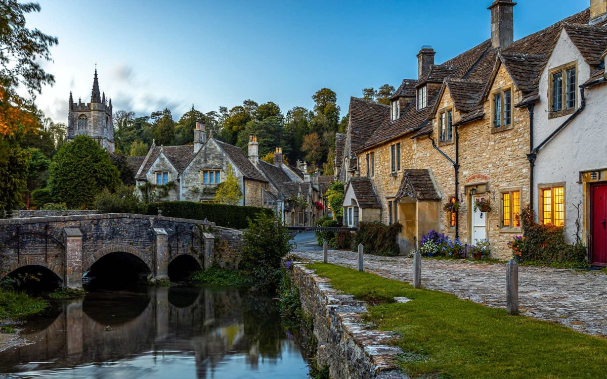 This Cotswolds village has stone houses, cobblestone streets and a foot bridge.