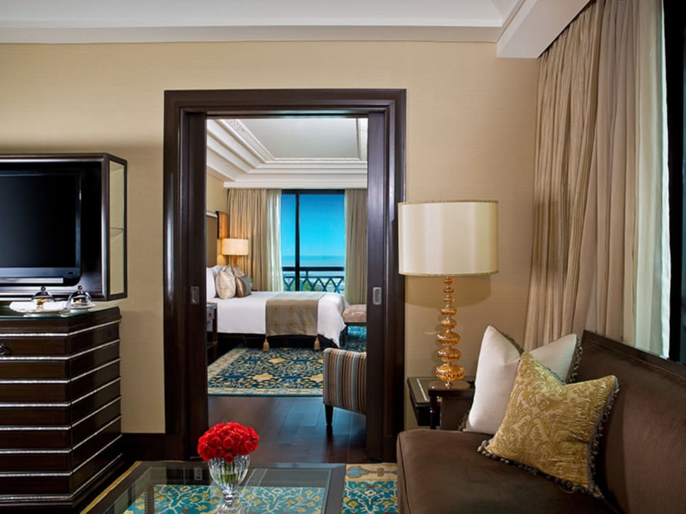 A lounge and bedroom at the Leela Palace in Chennai