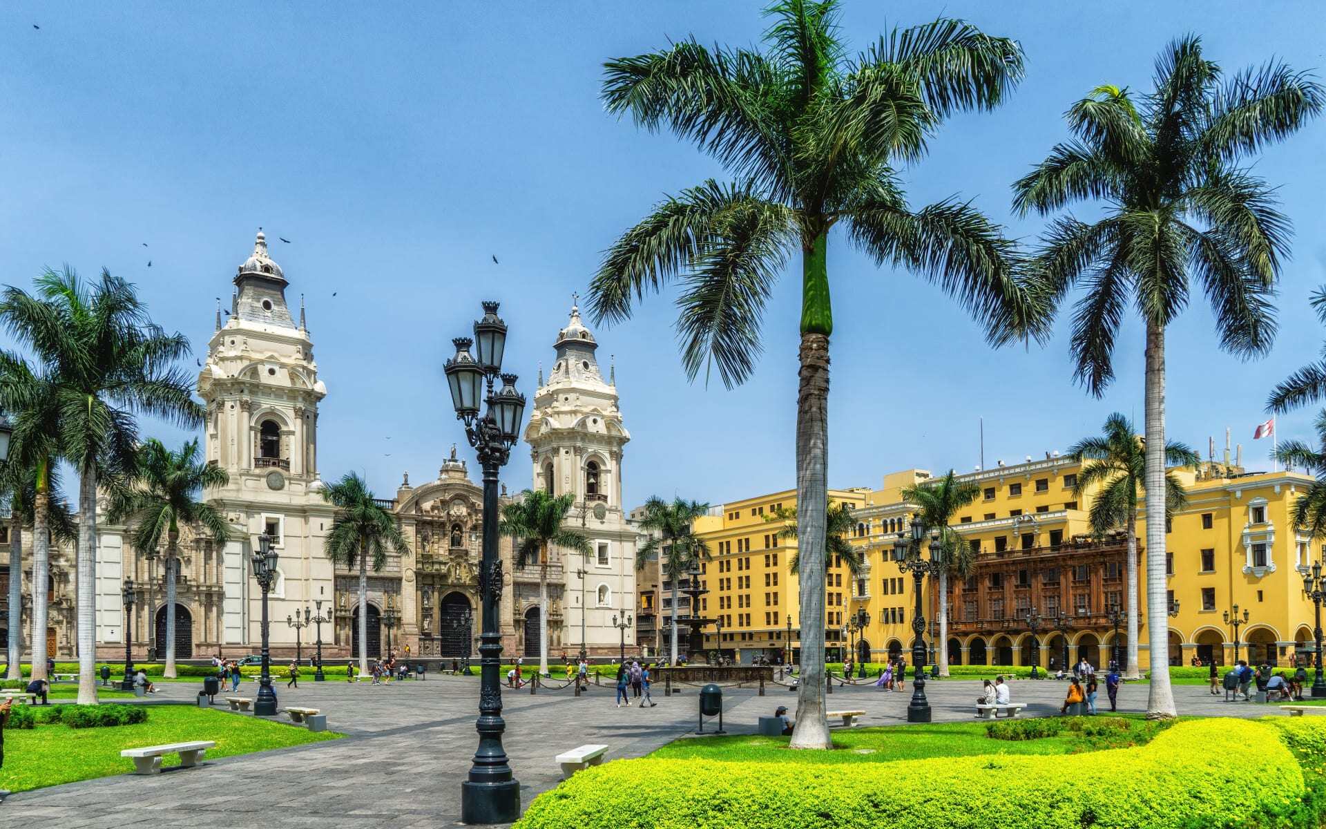 Lima in Peru hass colonial buildings and palm trees.