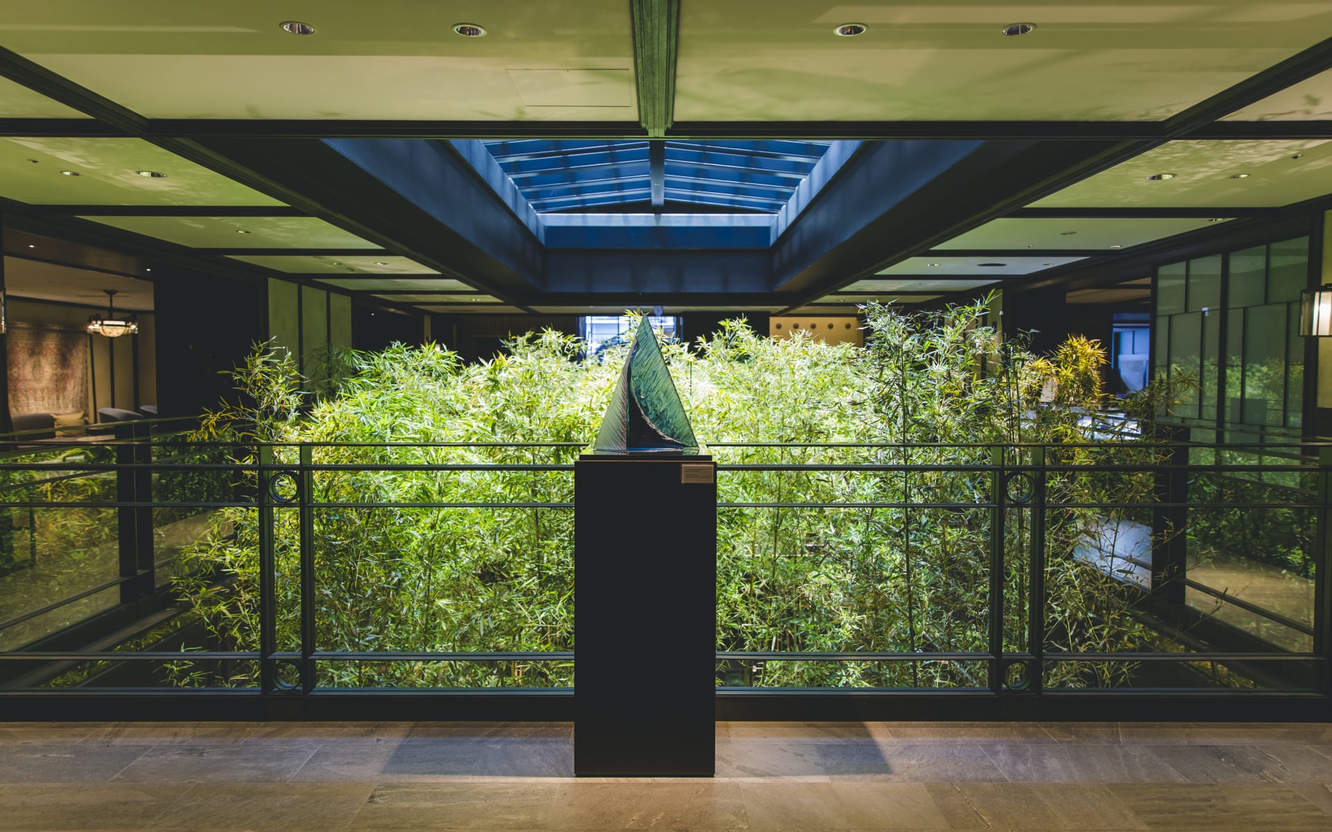 The lobby at Dhawa Yura has a square space with real bamboo trees. 
