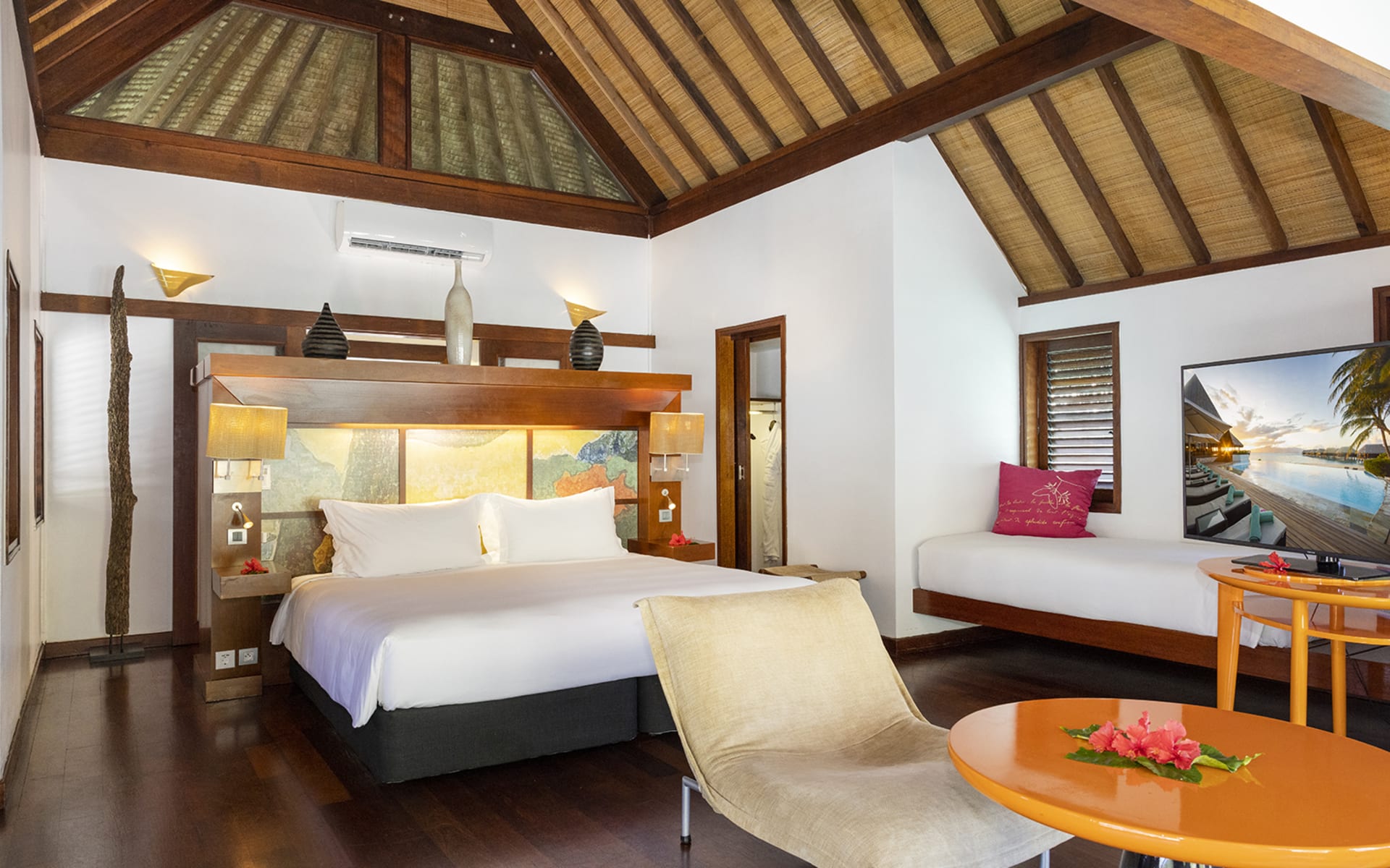 Bedroom in luxury overwater bungalow