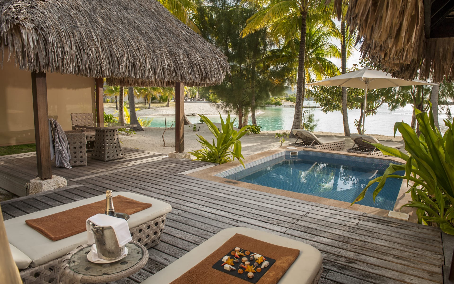 swimming pool on beach front with ocean view