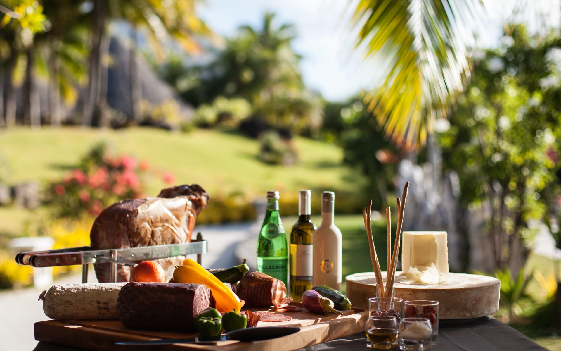 Delicious food with palm trees hanging above