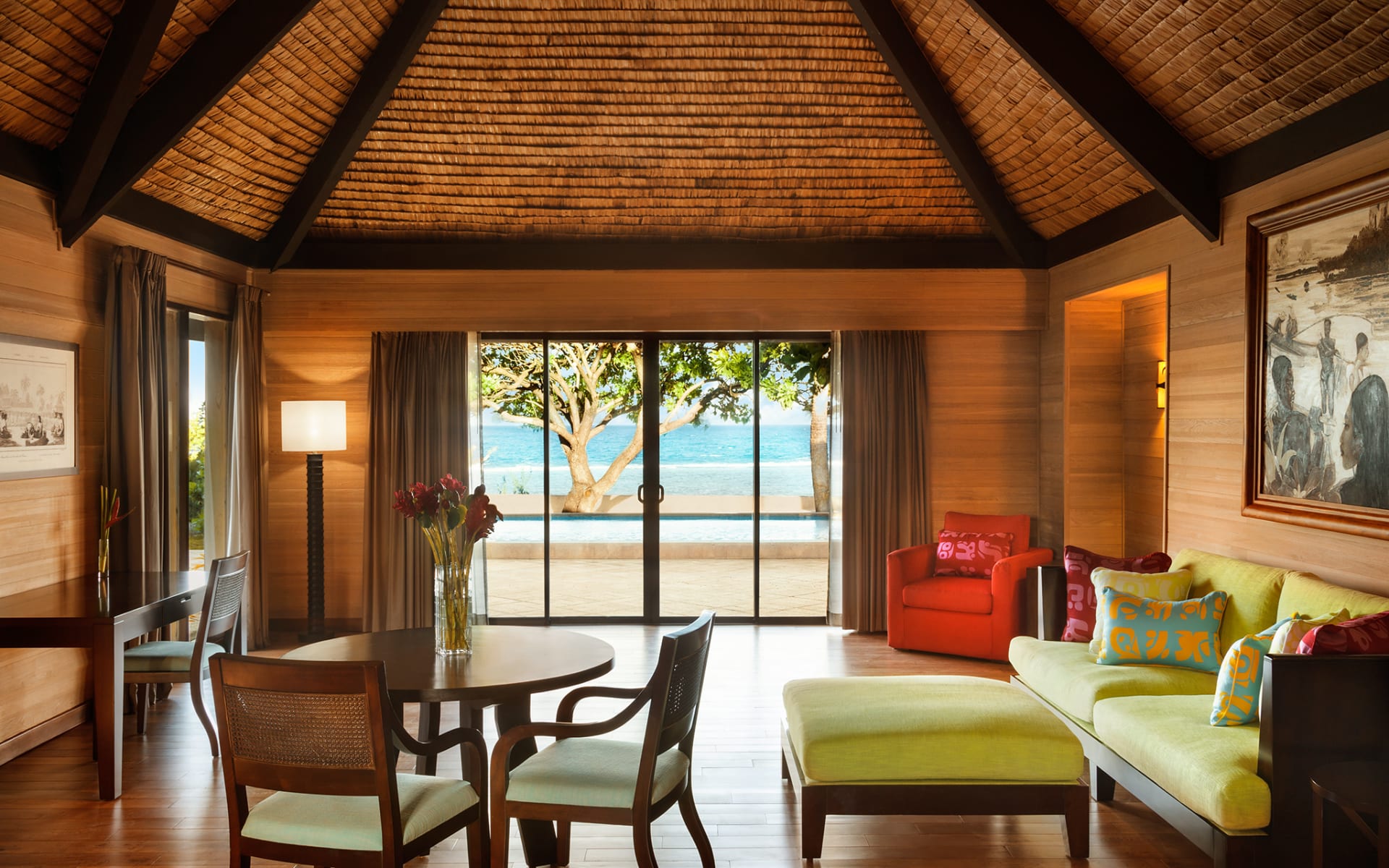 Beach front villa living room looking on to ocean