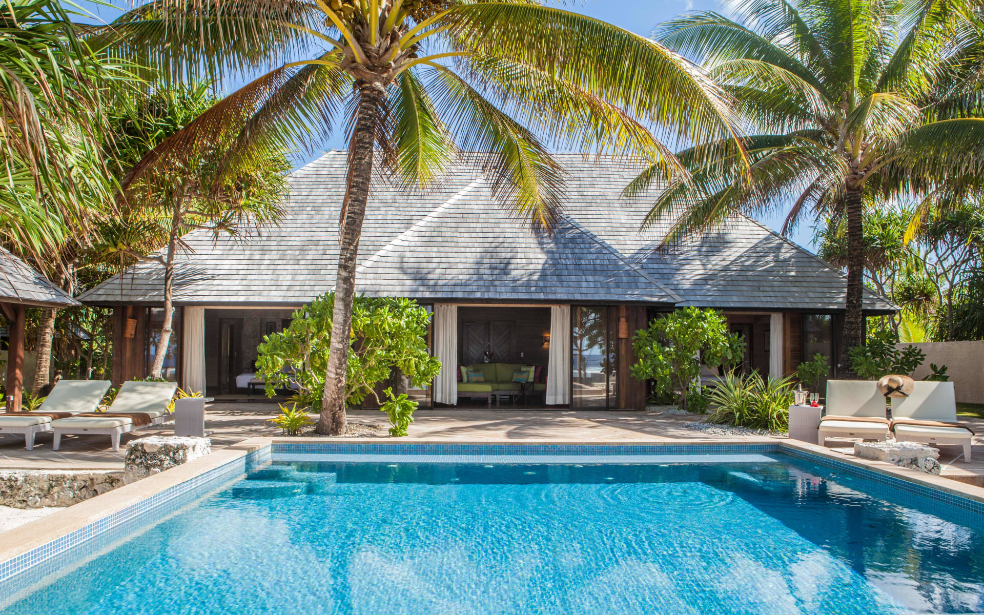 Swimming pool in front of villa