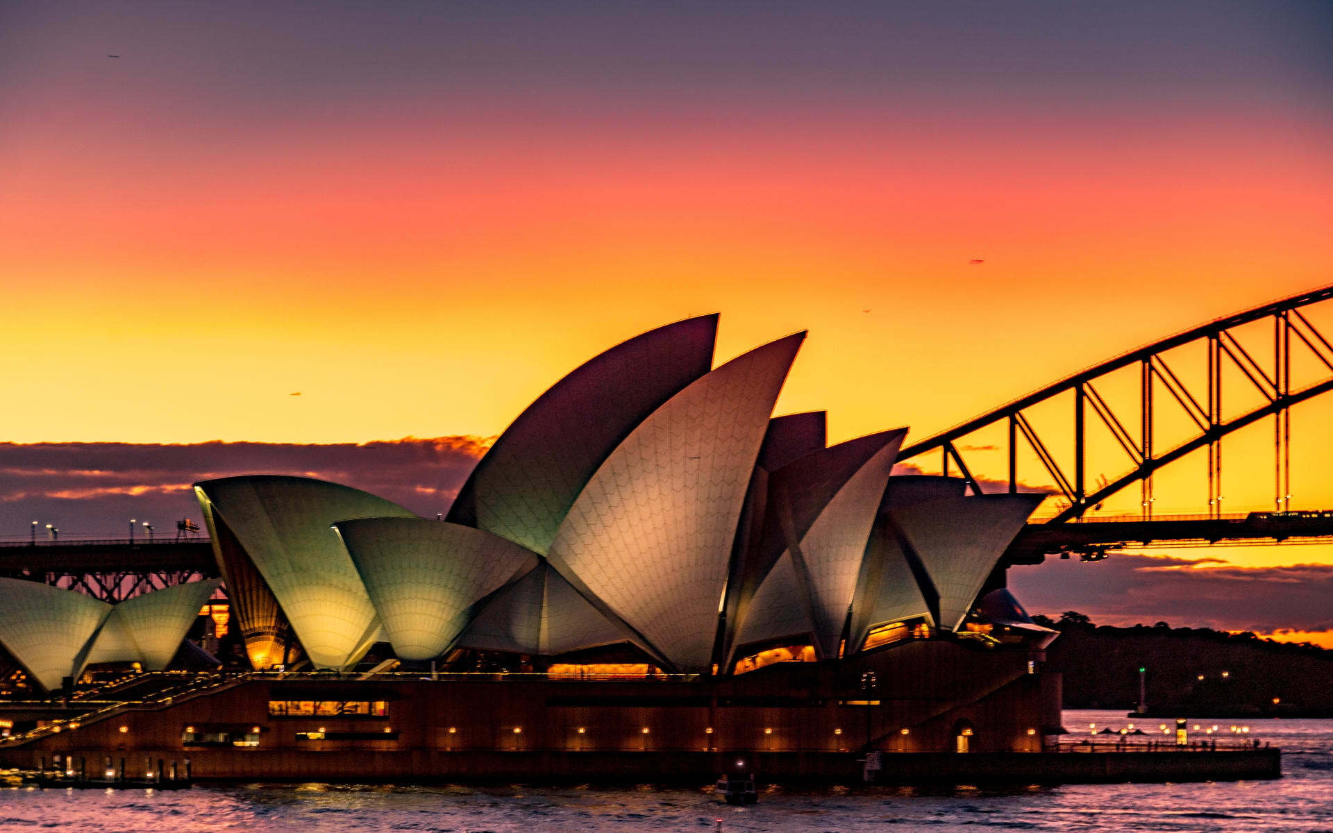 The Sydney Opera House looks beautiful at sunset in Sydney, Australia.