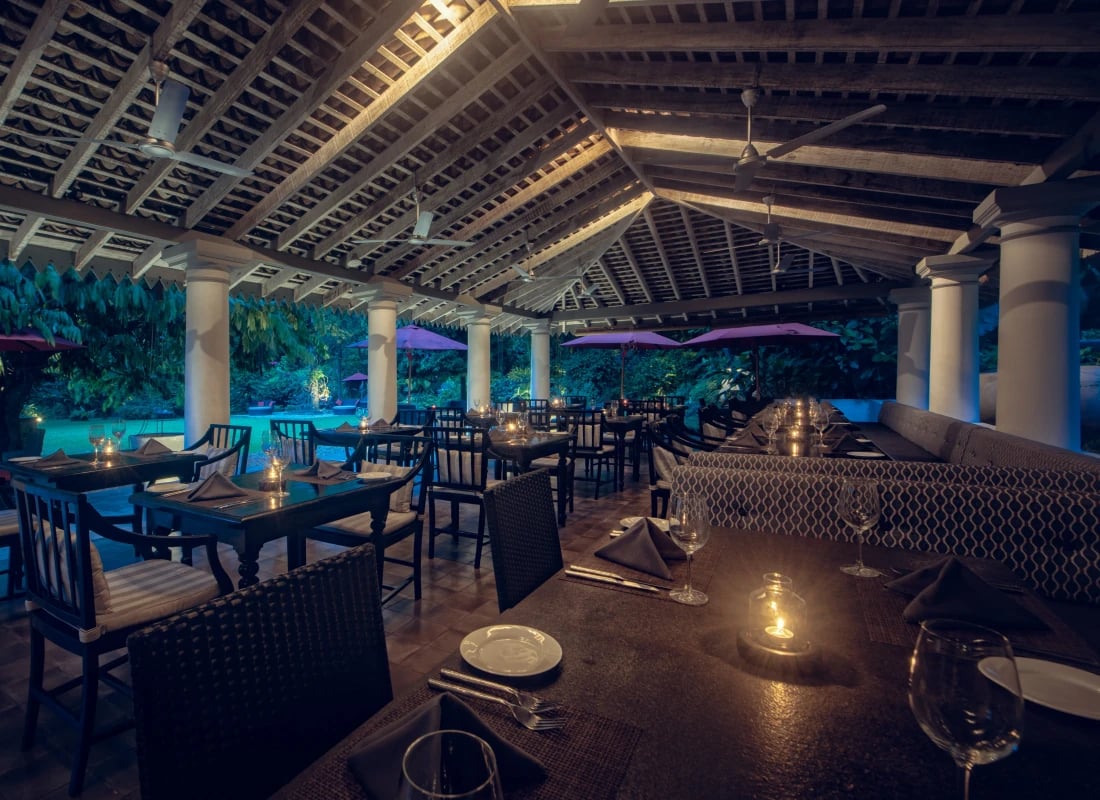 The main restaurant is dimly lit during the early evening by candles. The decor is modern and sleek.