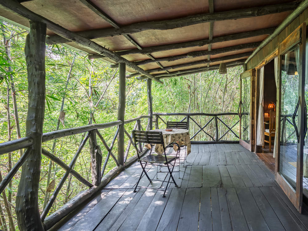 A table and chairs on a balcony