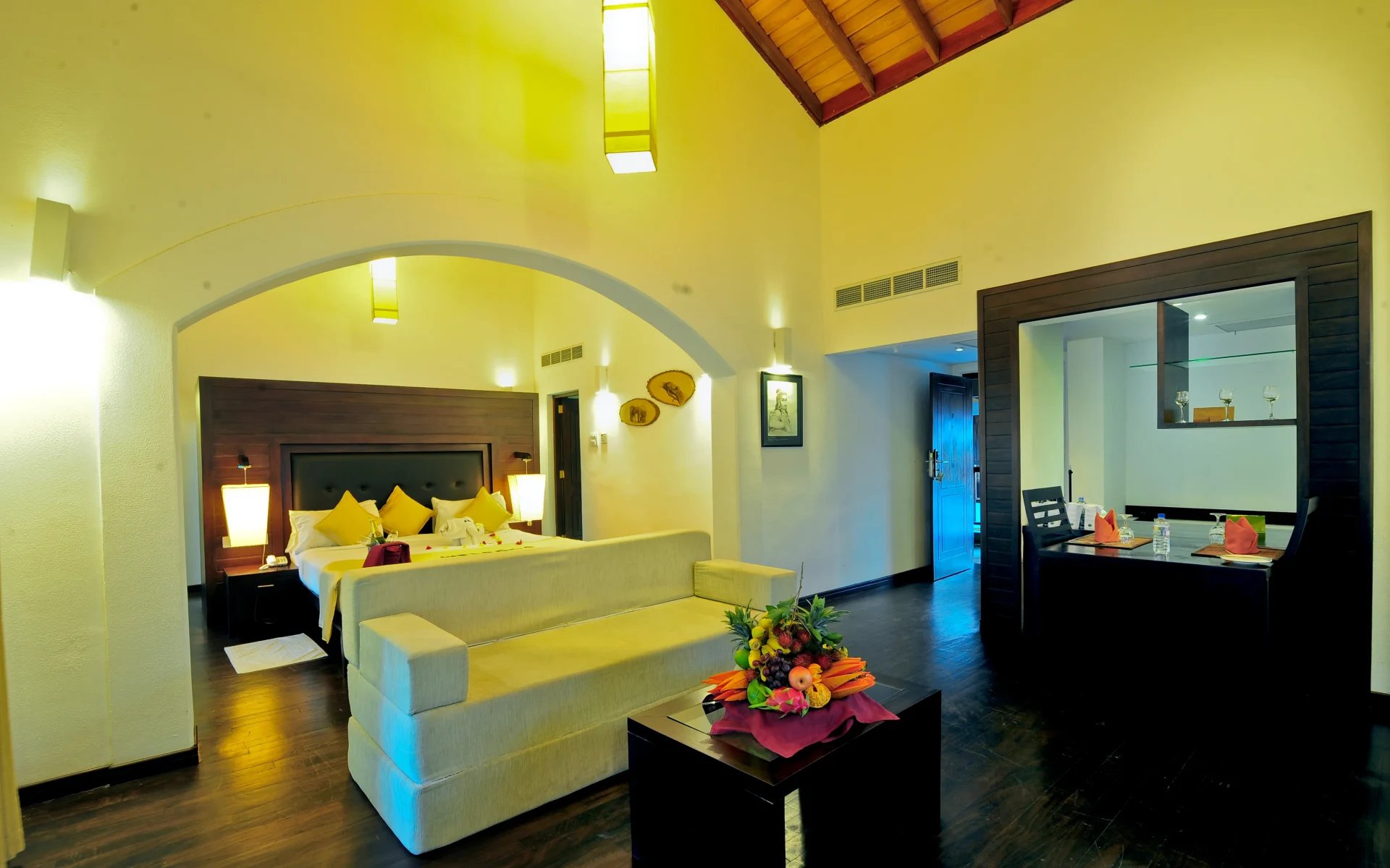 One of the Luxury Suites is well-lit and opens up-to a separate living space.