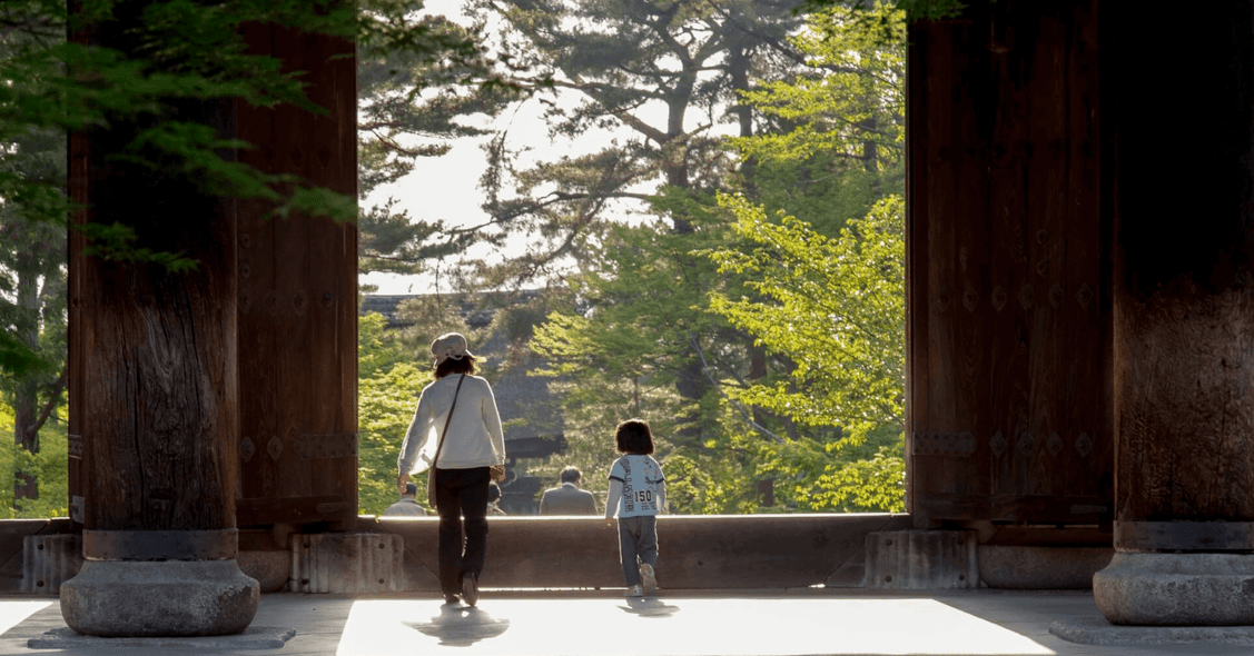 Mother and child exploring Japanese temples