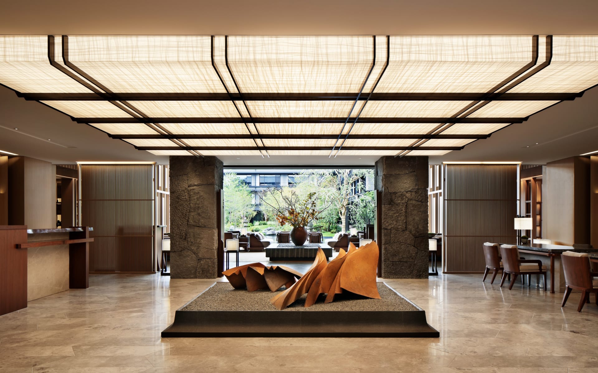 The Mitsui's reception has a lot of open space with an art fixture in the middle. 