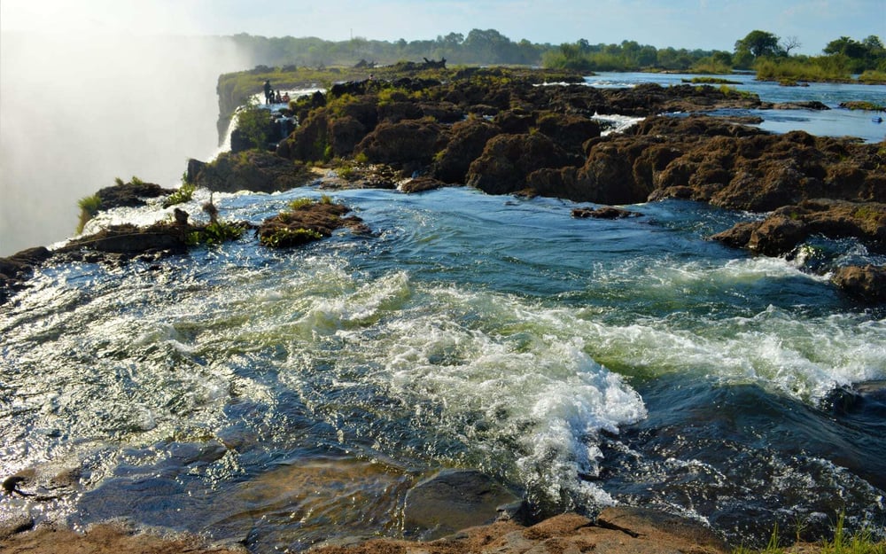 Devil's Pool sits at the top at Victoria Falls on the Zambian side, with a sheer drop!