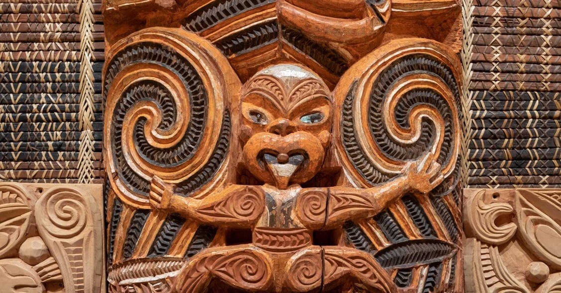 A wooden, Maori carving in New Zealand.