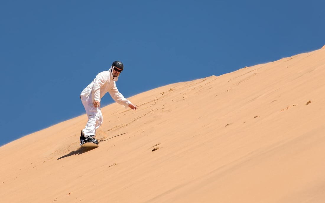 you can go sandboarding in Namibia during a luxury tour.