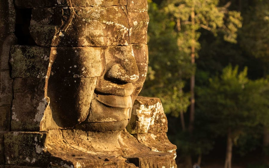 Close up of a stone statue at Angkor Thom.