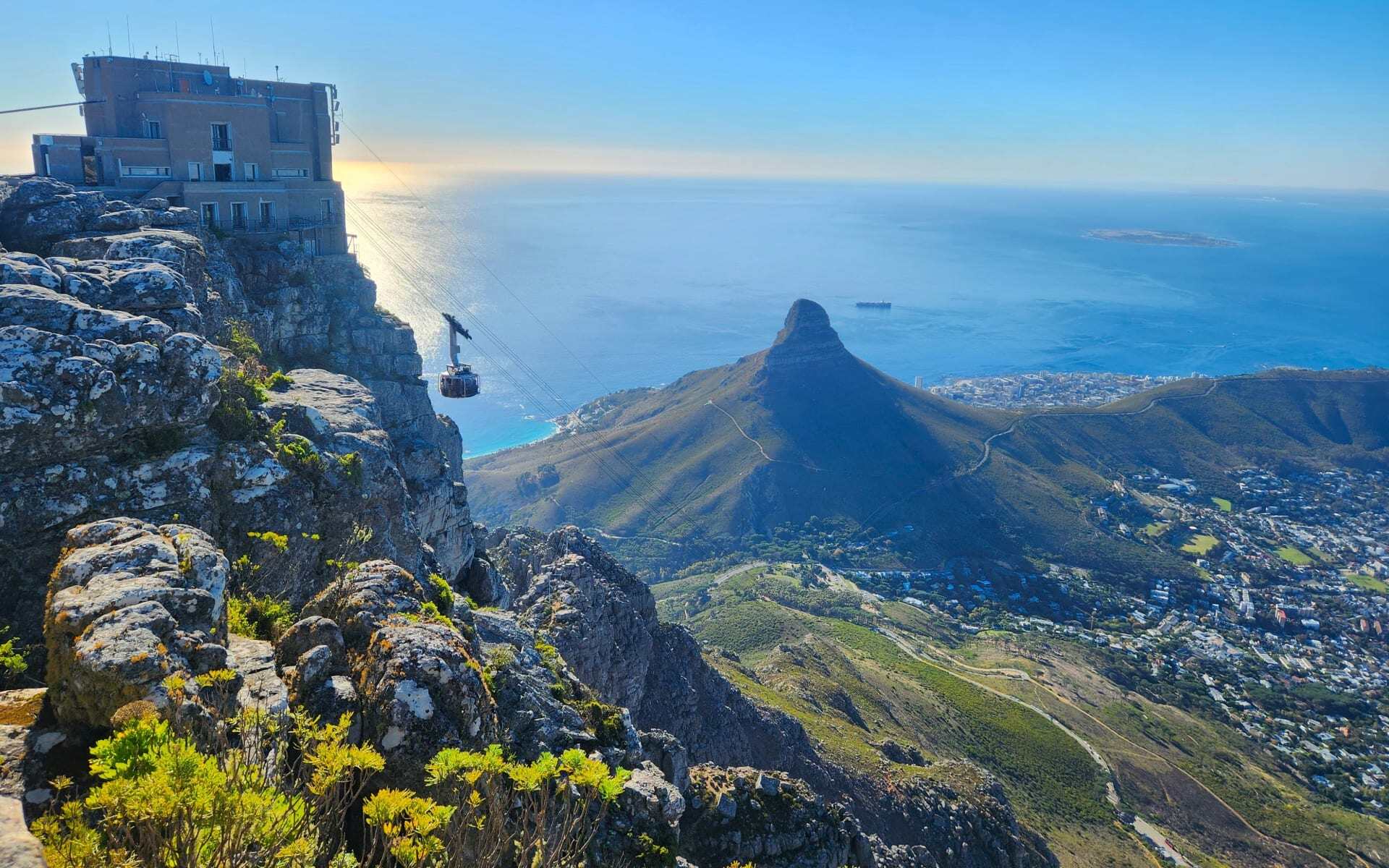 A cable car descends from Table Mountain in Cape Town.
