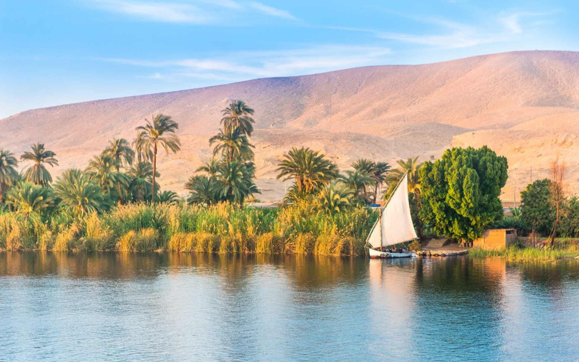 A sailboat sails along the River Nile in Aswan.