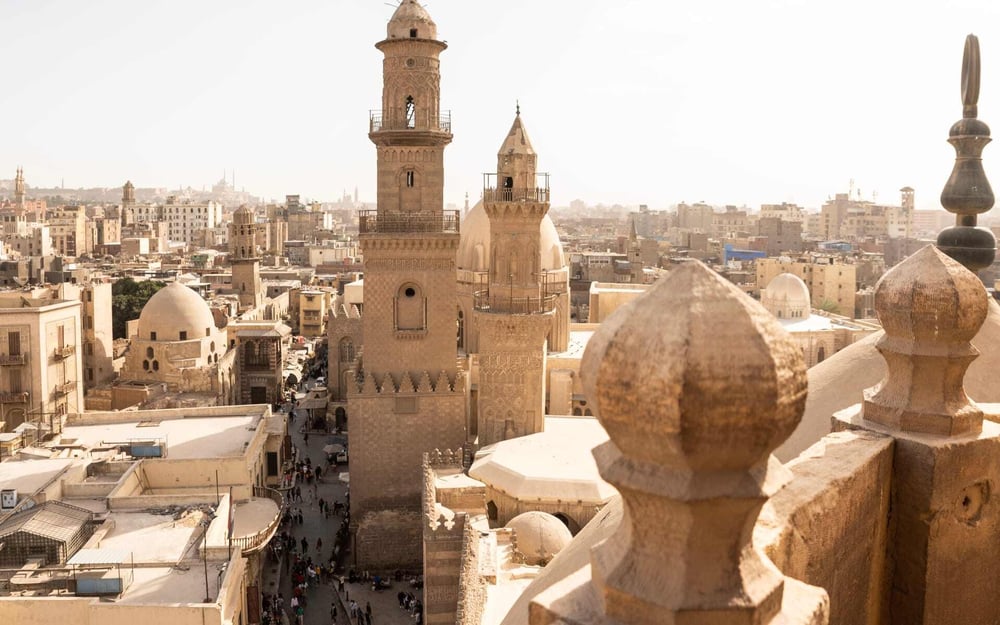 Old Cairo has a sepia tone and huge sandstone temples.