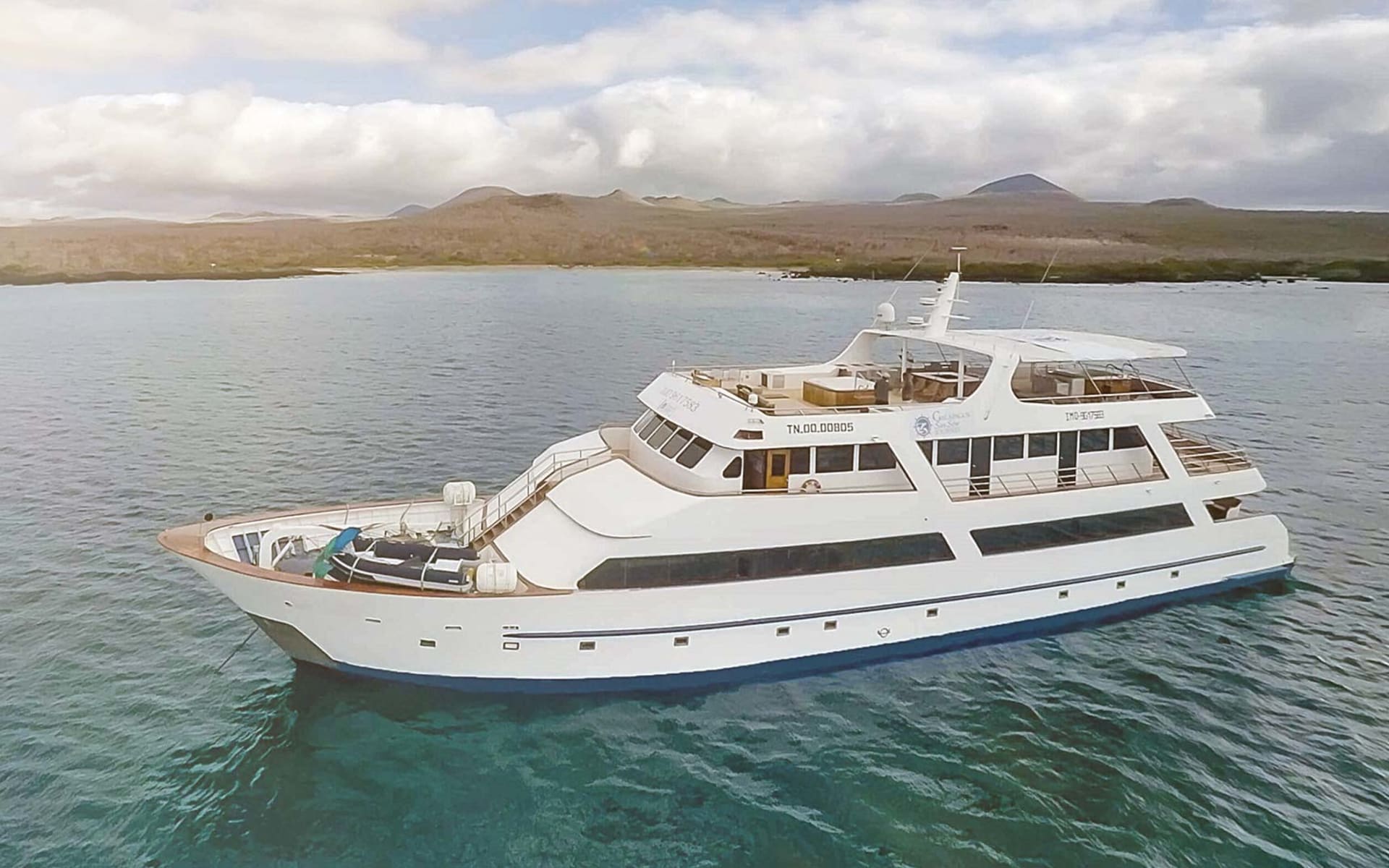 The Galapagos Sea Star Yacht is sleek with a white exterior.