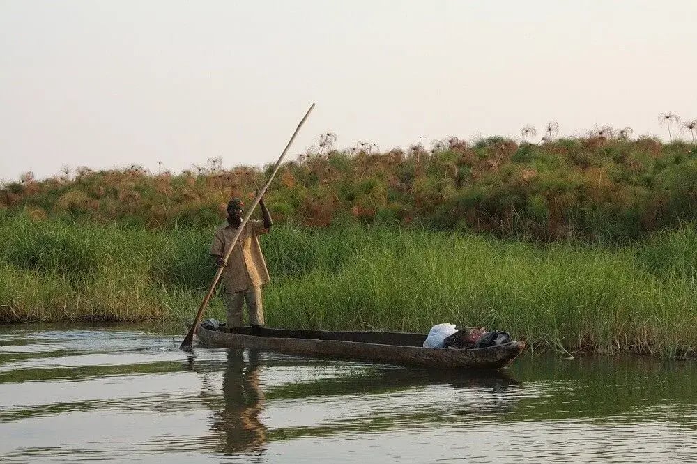 when_to_visit_victoria_falls_zambezi_river_traditional_boat
